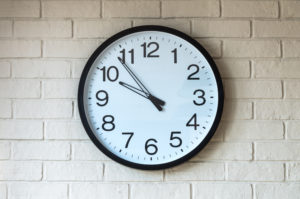 Clock on brick wall a clock on brick wall displaying the time 9:53
